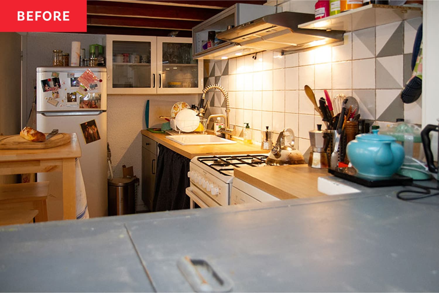 Striking Turquoise Cabinets Transform a Cramped, Dark Kitchen ...
